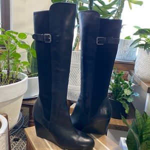 Used black tall boots.